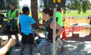 A finisher gets her medal